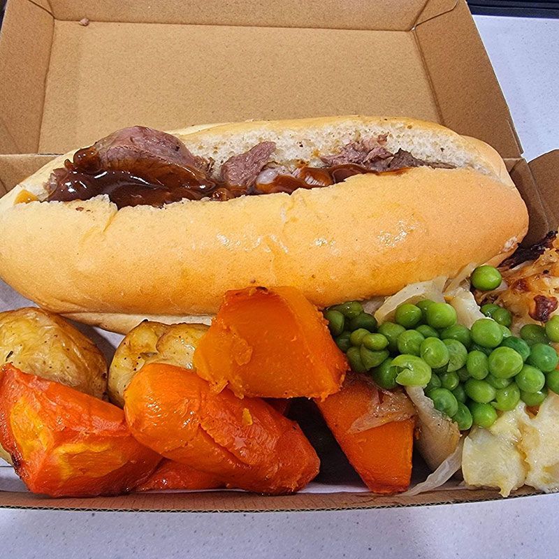 A Sandwich With Meat and Vegetables in a Cardboard Box — Carpenter Carvery in Wendouree, VIC