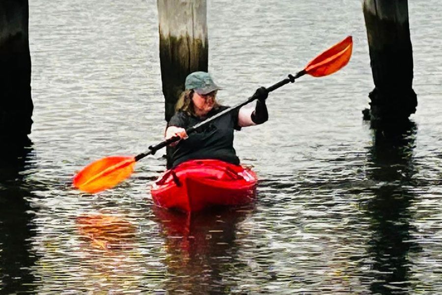 Emma Olivier paddling her kayak