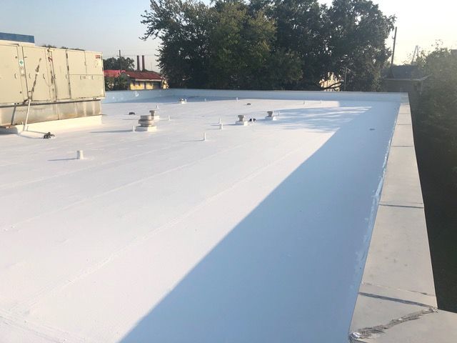 White flat commercial roof.