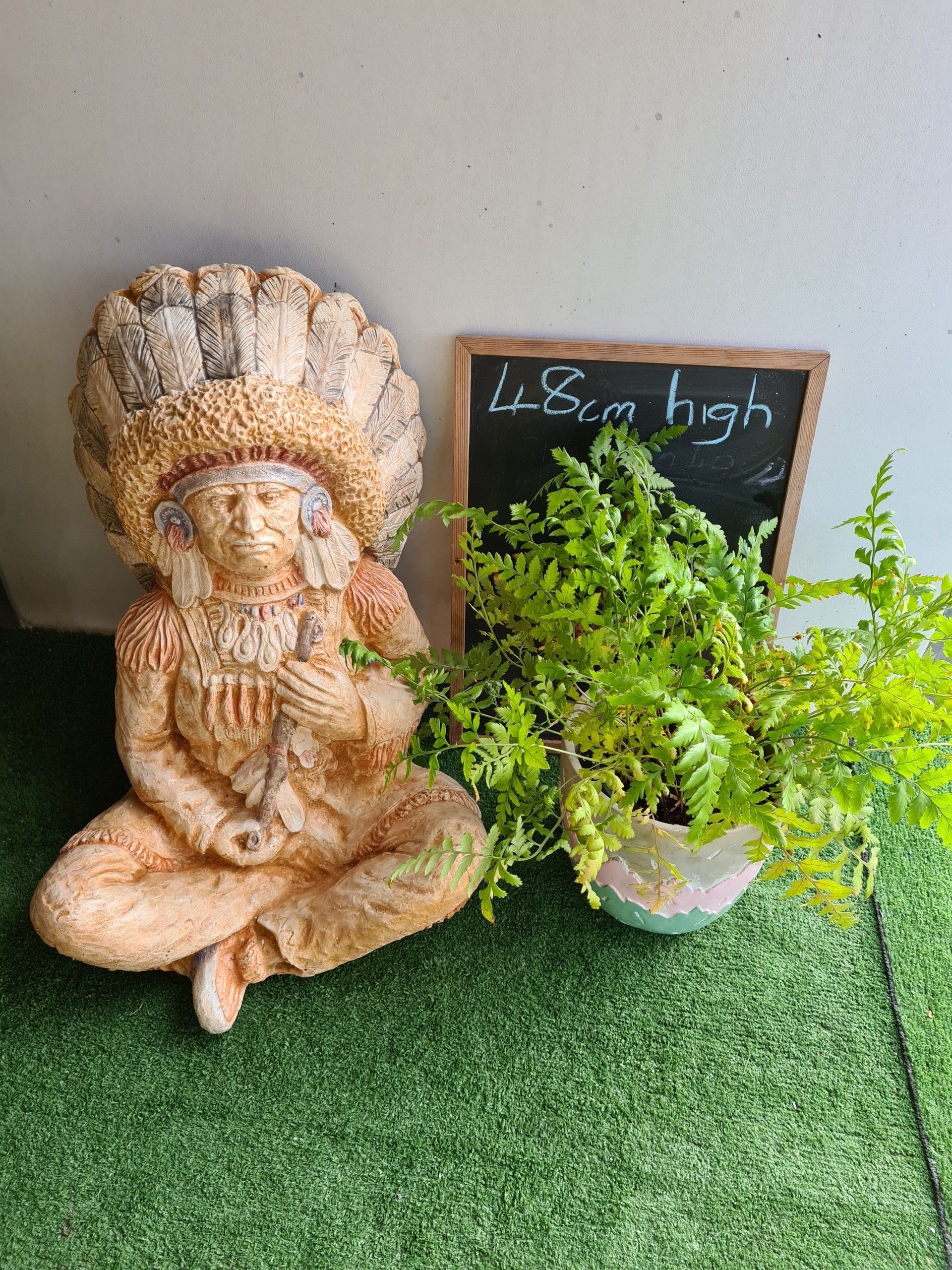 Sitting Indian with Peace Pipe