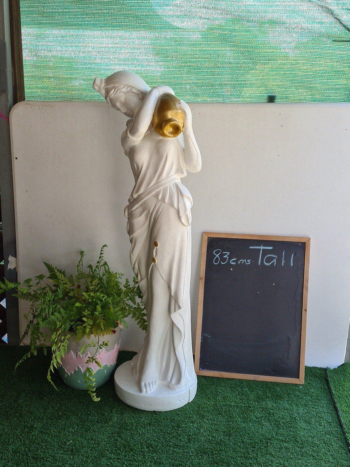 Concrete lady water carrier