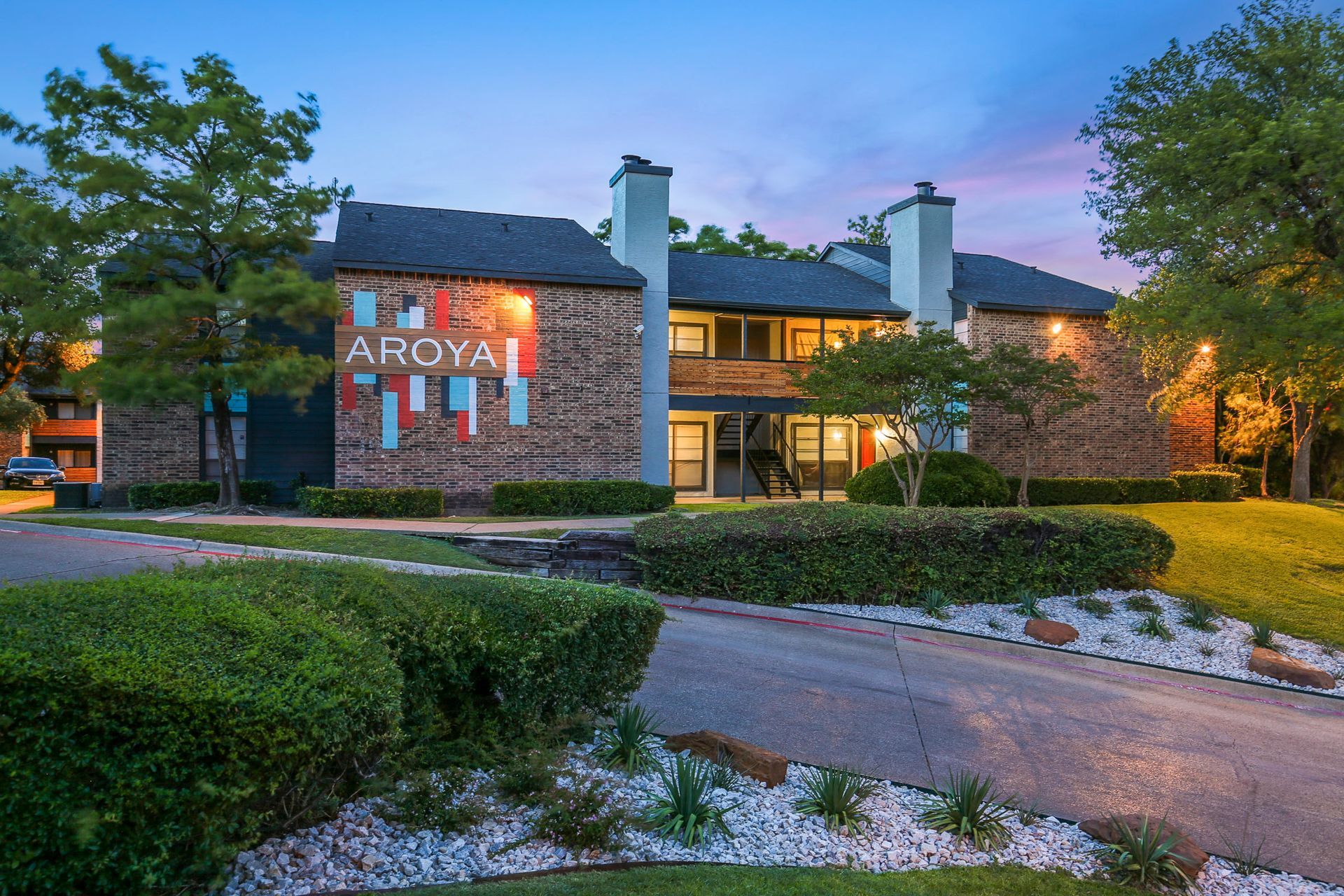 Apartment building entrance with brick facade, 