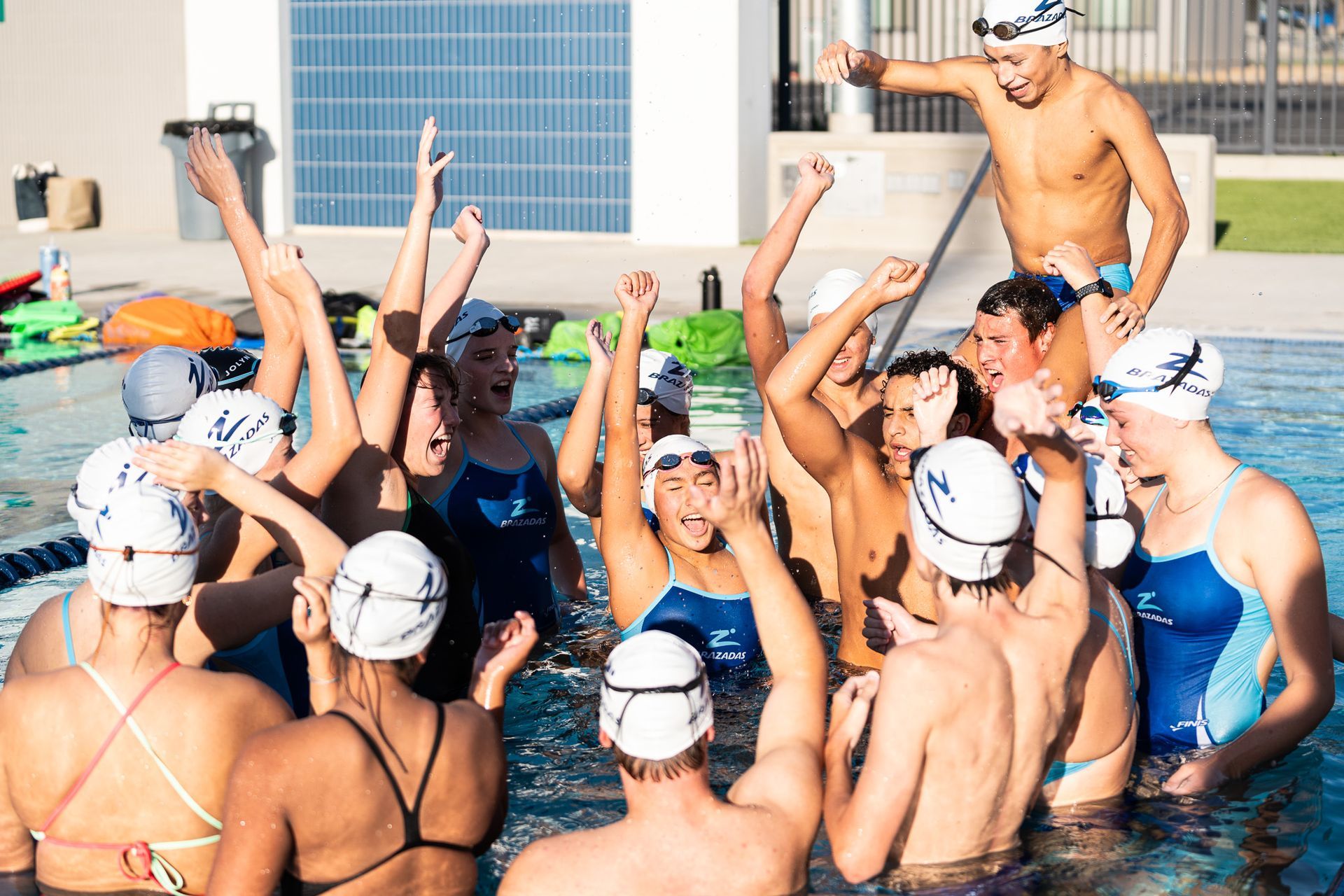 B-Town Brazadas Swim Club teammates in the pool at the East Side Aquatics Center in Bakersfield, CA