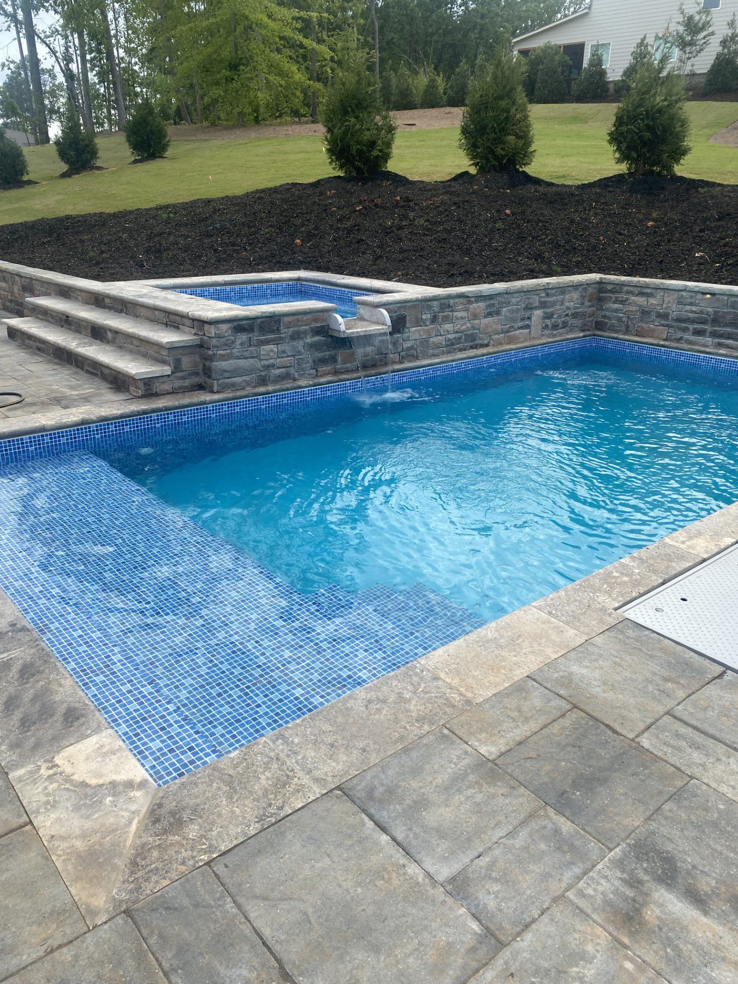 Crystal-clear water in newly installed Desjoyaux pool