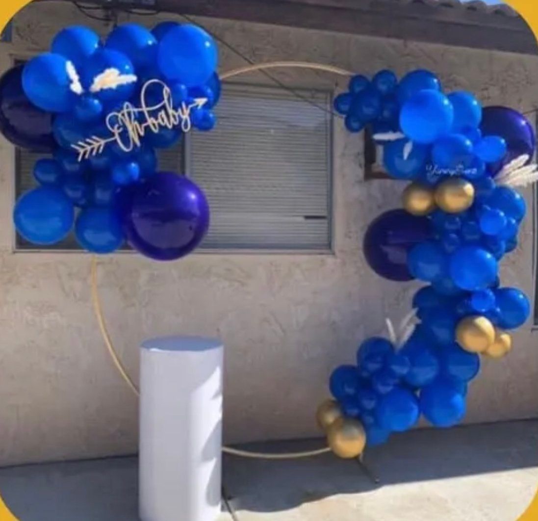 A bunch of blue and purple balloons with the word baby on it