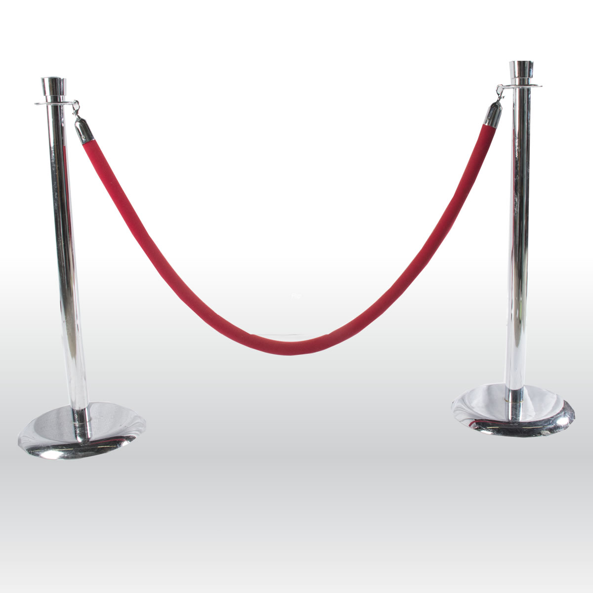 A silver pole with a red rope attached to it