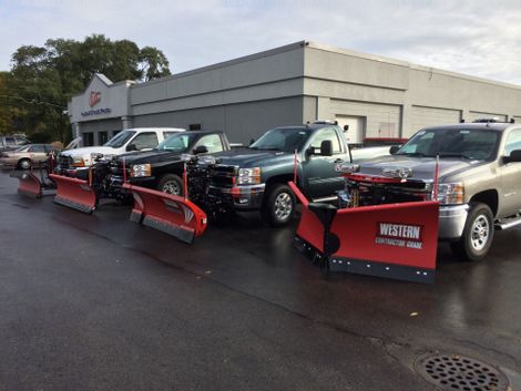 Snowplow Equipment — Truck with Snowplow Attachment in Traverse City, MI