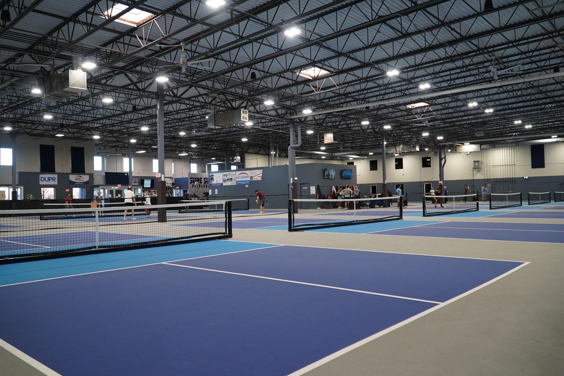 pickleball courts in a warehouse building