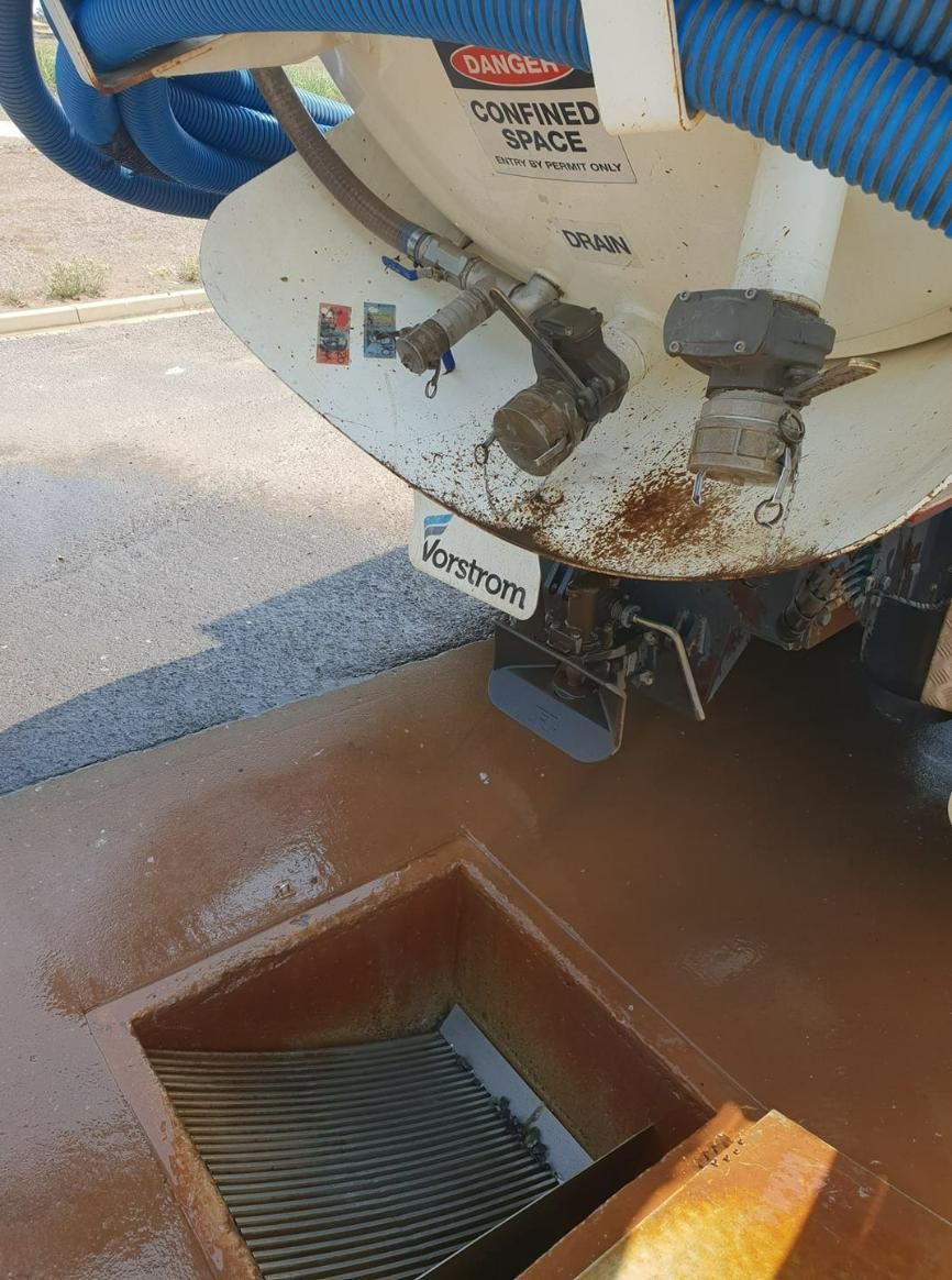 A Close Up Of The Back Of A Vacuum Truck — Paap's Cleansing Services In Childers, QLD
