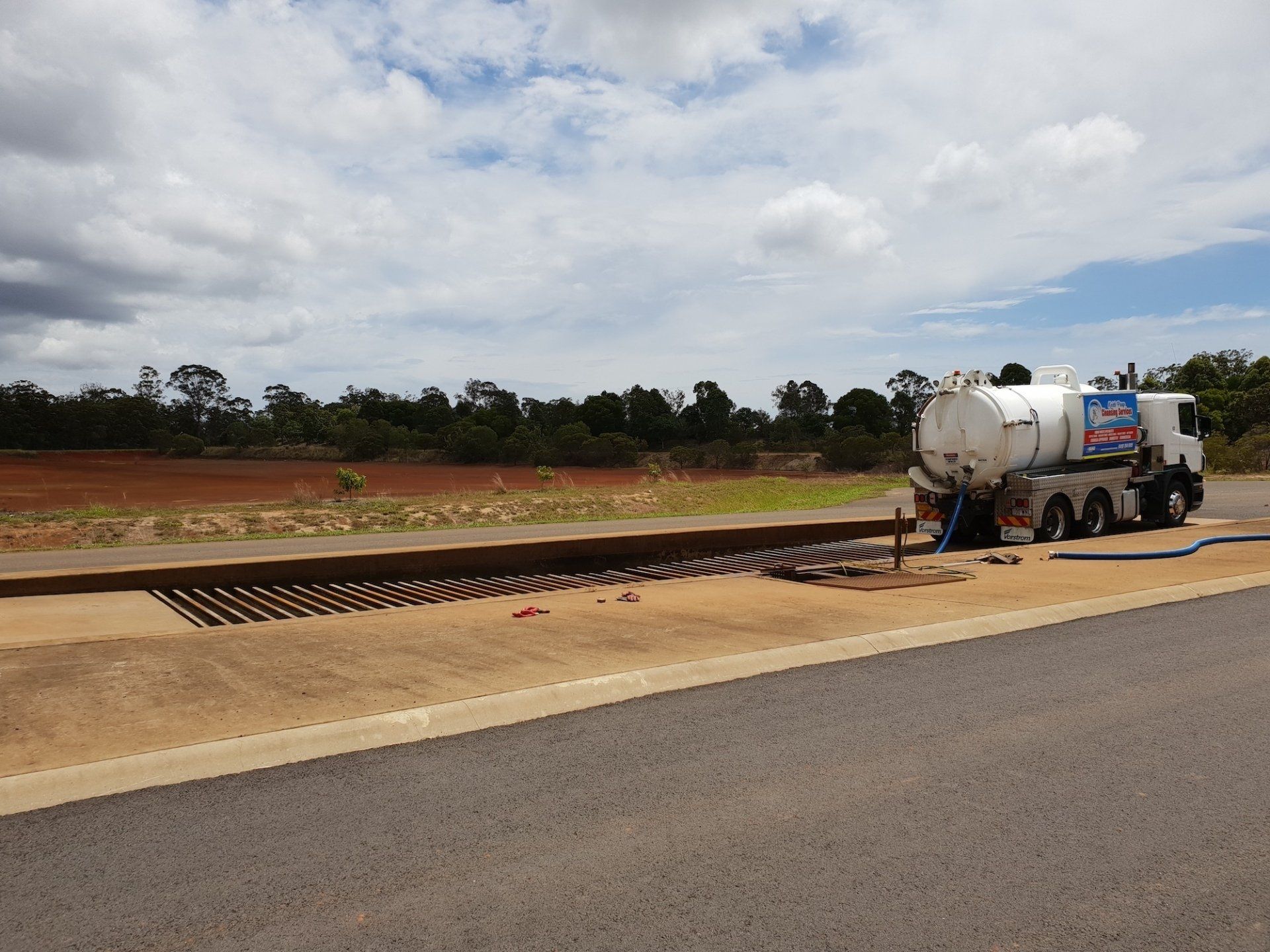 A Tanker Truck Is Parked On The Side Of The Road — Paap's Cleansing Services In Gin Gin, QLD