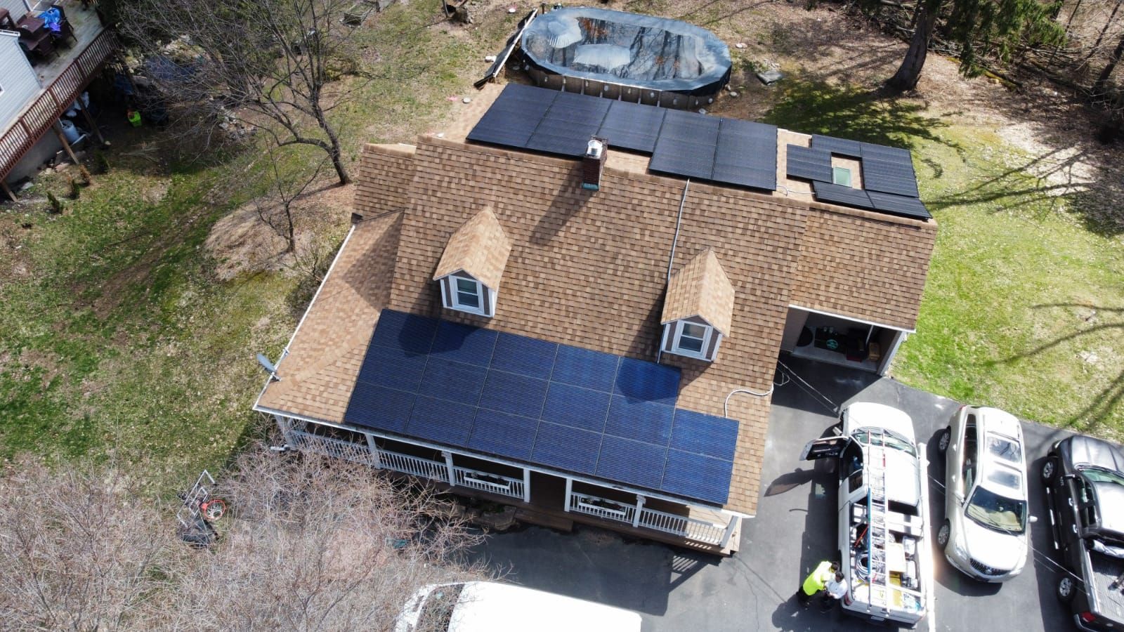 Overhead view of house with solar panels on roof