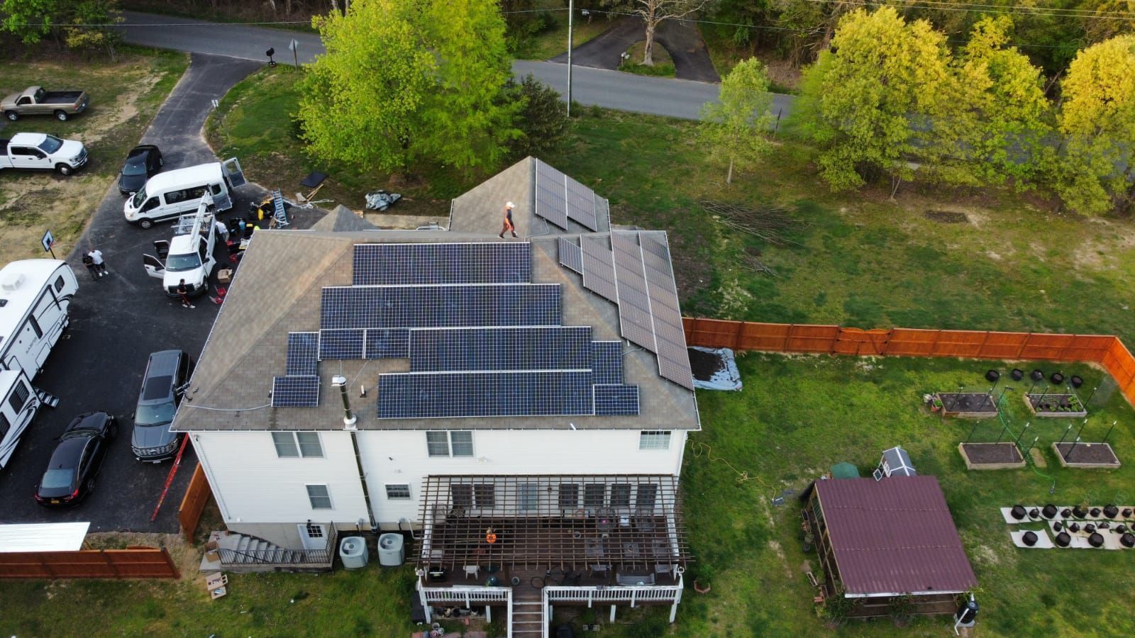 Solar panels installed on a two-story house roof
