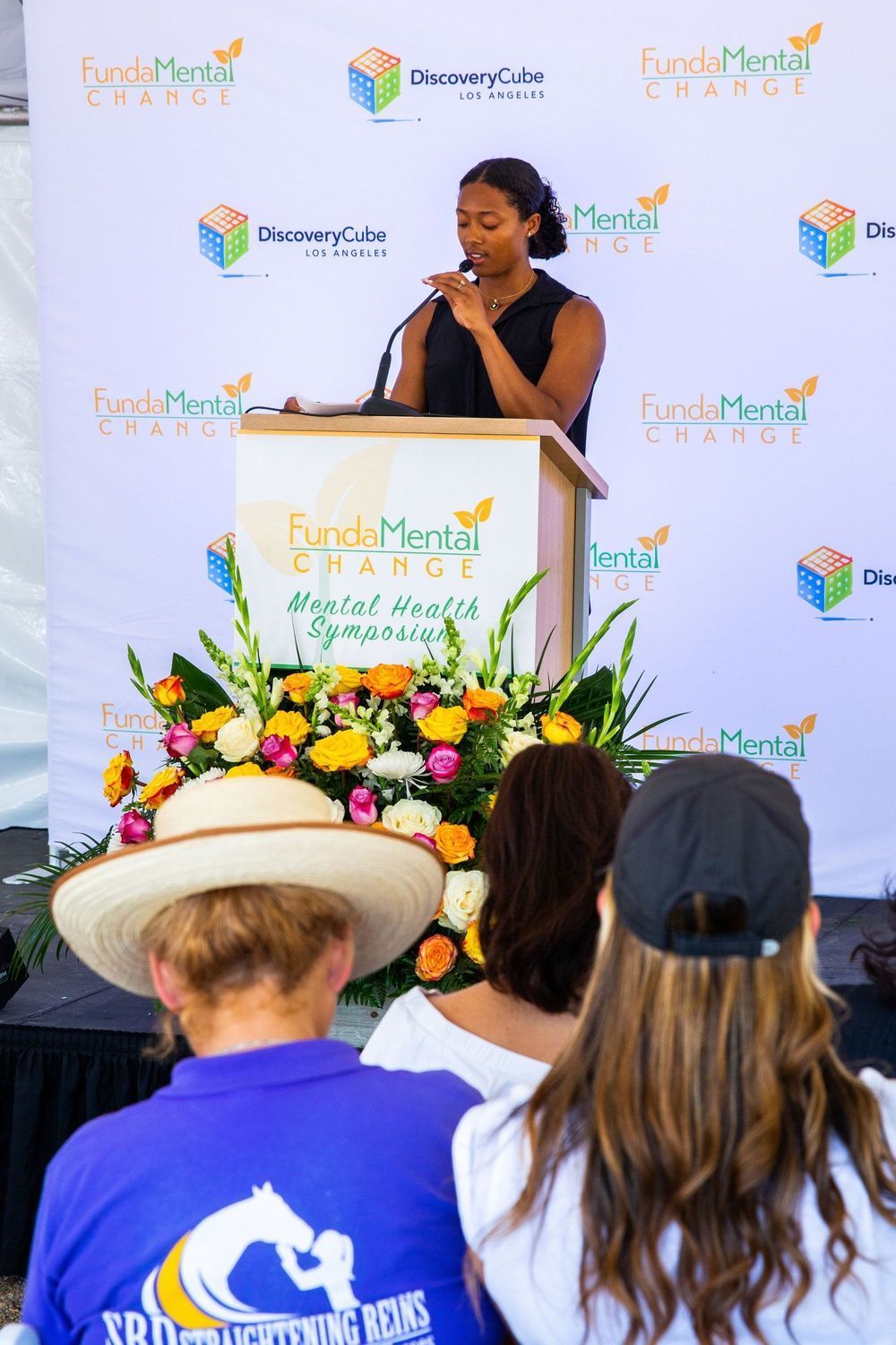 FundaMental Change partners with Cardenas Foundation to award mental health scholarships; graduates throwing caps.