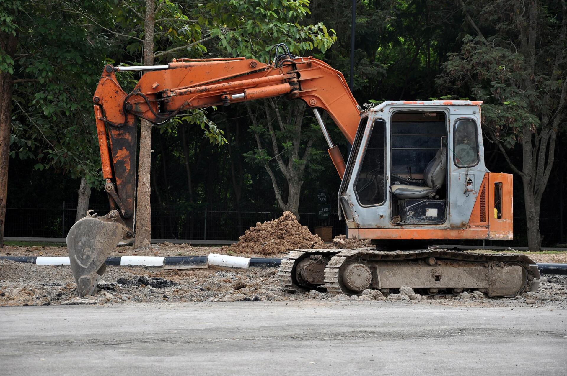 excavator repairing the road