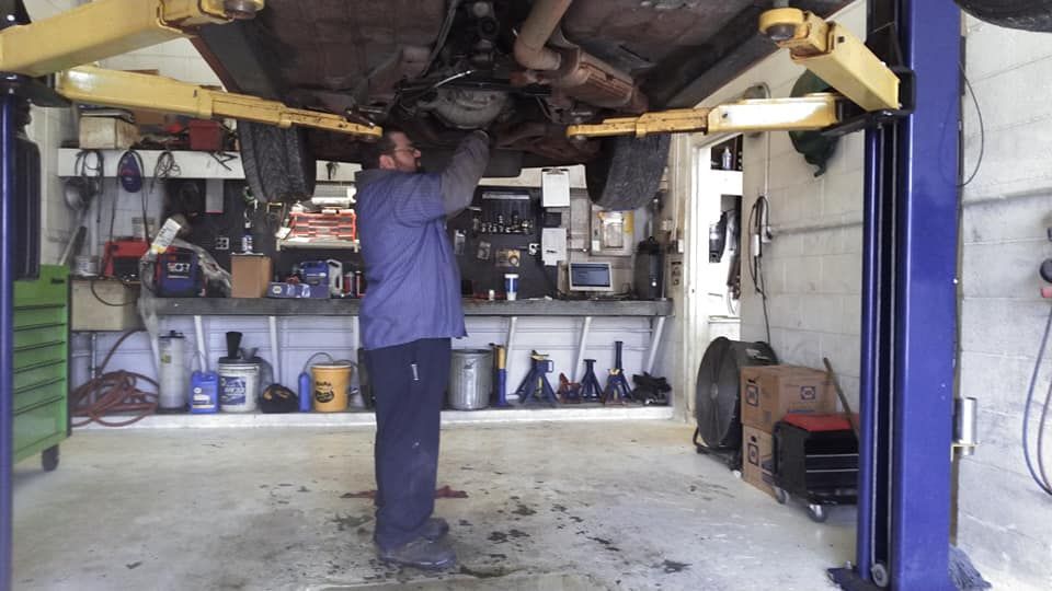 Man Fixing Car | Danville, IL | Auto Mobile Diagnostics