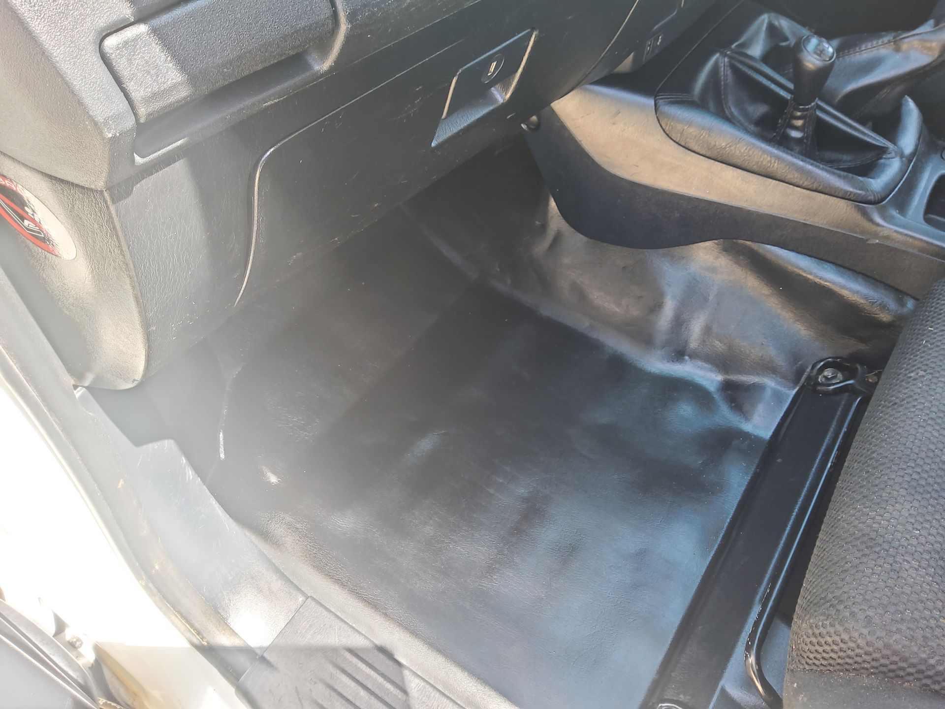 The inside of a car with a black carpet on the floor — Country Dirt Blasters Mobile Car Detailing In Murwillumbah, NSW