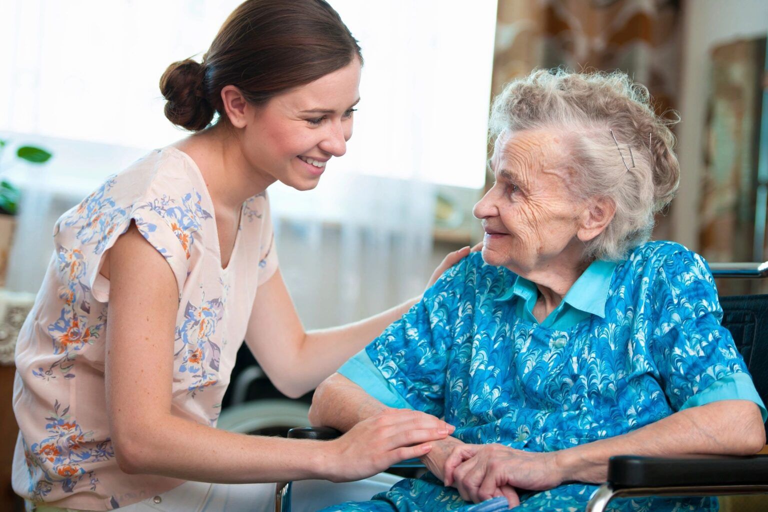 photo of a caregiver at a patients home