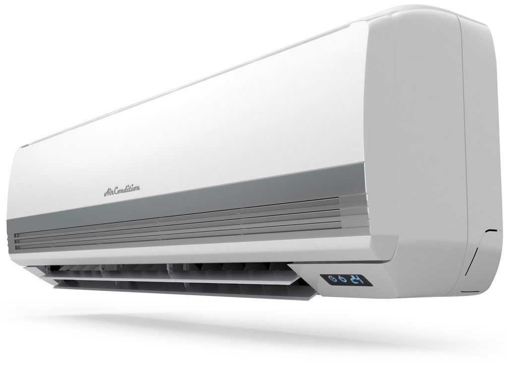 A white air conditioner is hanging on a white wall.