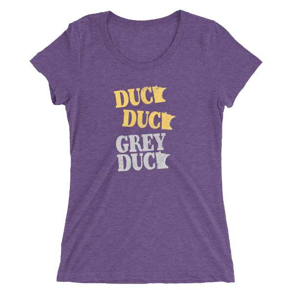A purple shirt that says duck duck grey duck