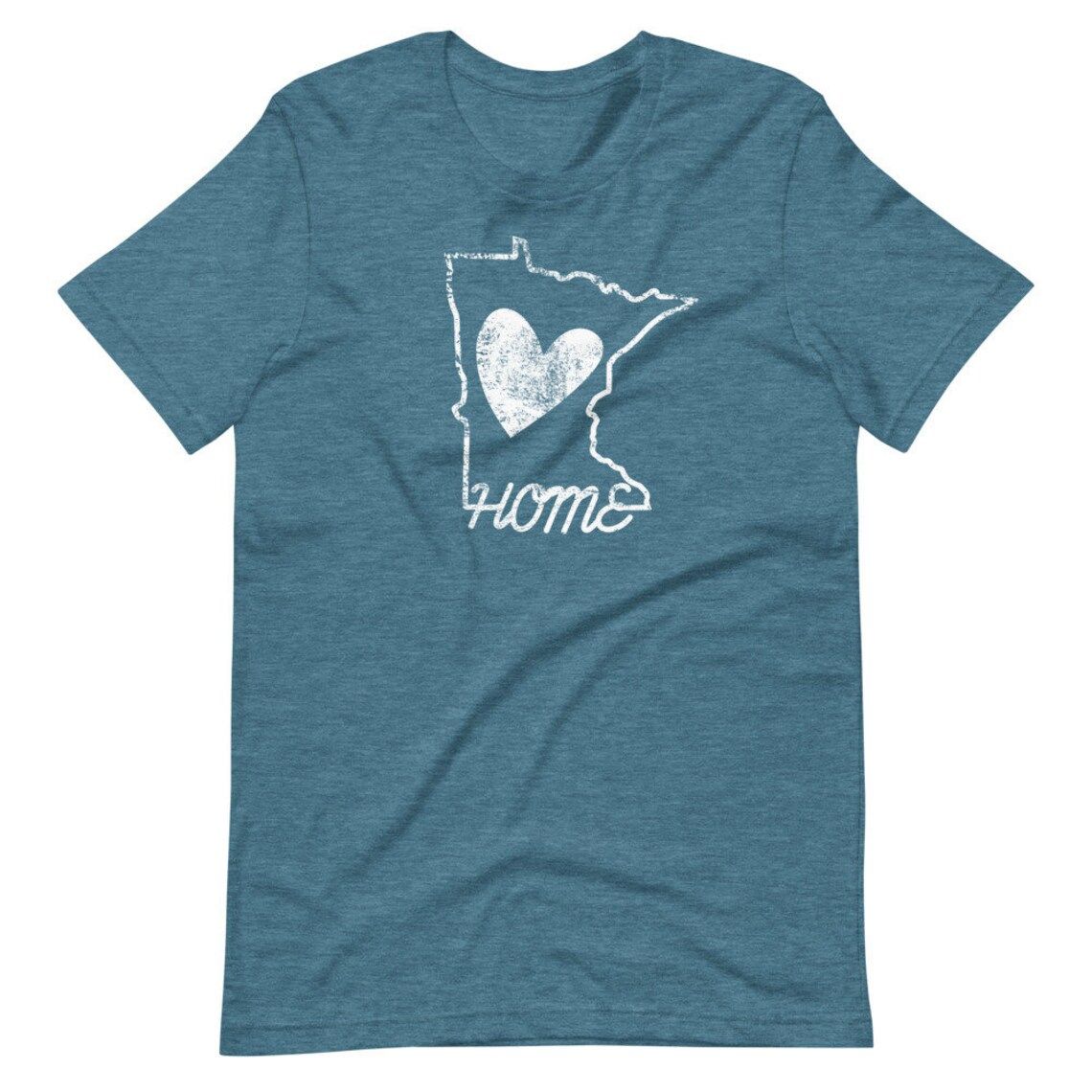 A blue t-shirt with a heart and the word home on it
