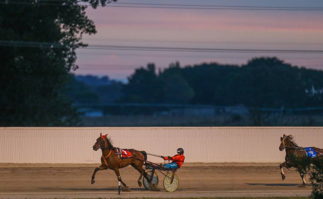 A horse completes the final lap of its race