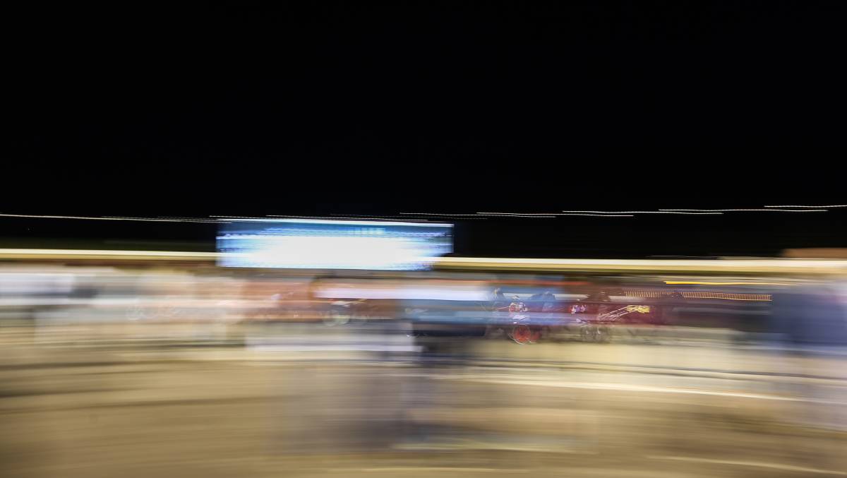 Horses race through crowds