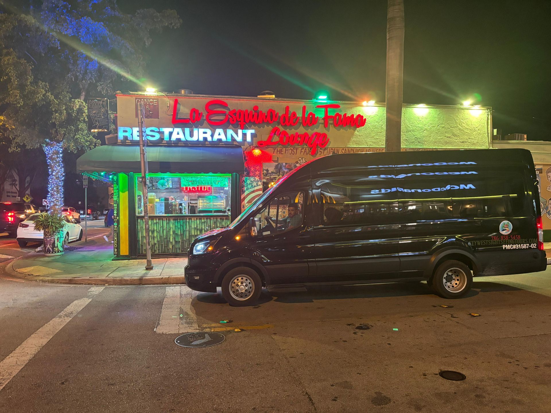 Black Bus parked in Little Havana during the Miami City lights sightseeing tour
