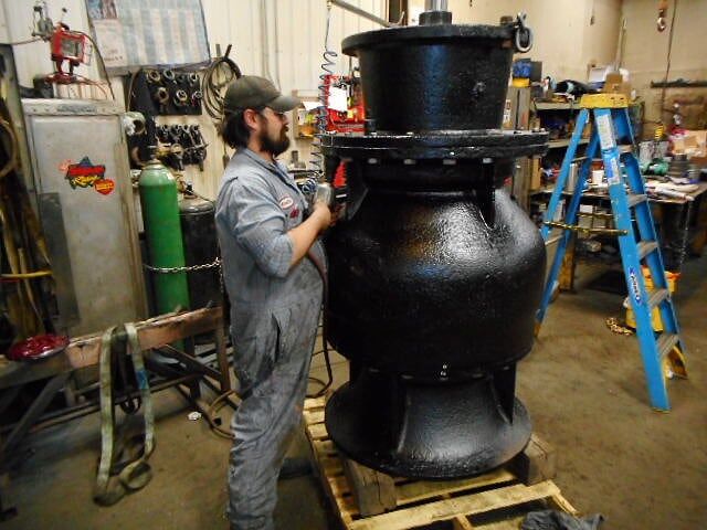 Technician Repairing Pump — in Billings, MT — S & S Machine Inc