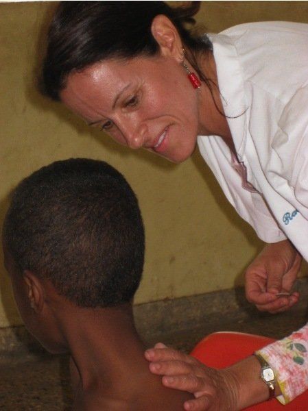 A woman in a white coat with the word rod on it
