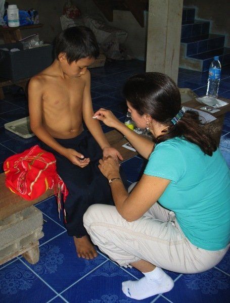 young boy being treated