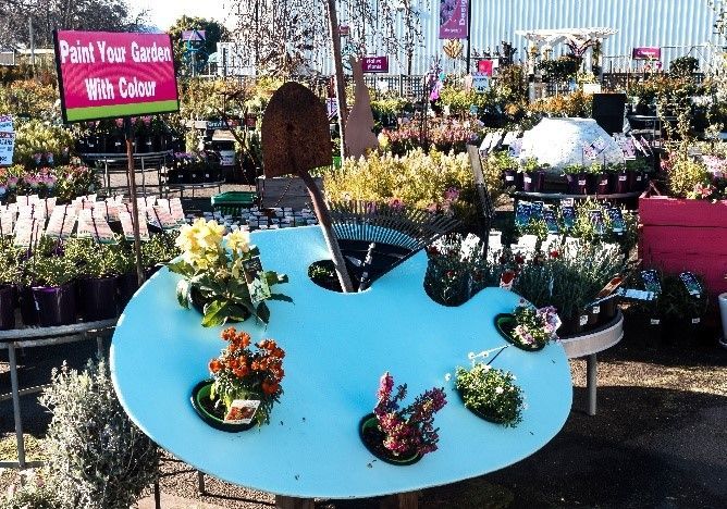 An artist’s pallet with plants and gardening tools in Stoneman’s Garden Centre. An artist’s pallet with plants and gardening tools in Stoneman’s Garden Centre.