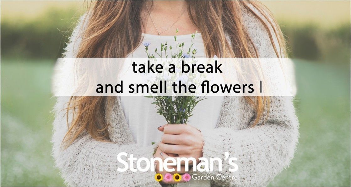 girl holding flowers with a text message across the image