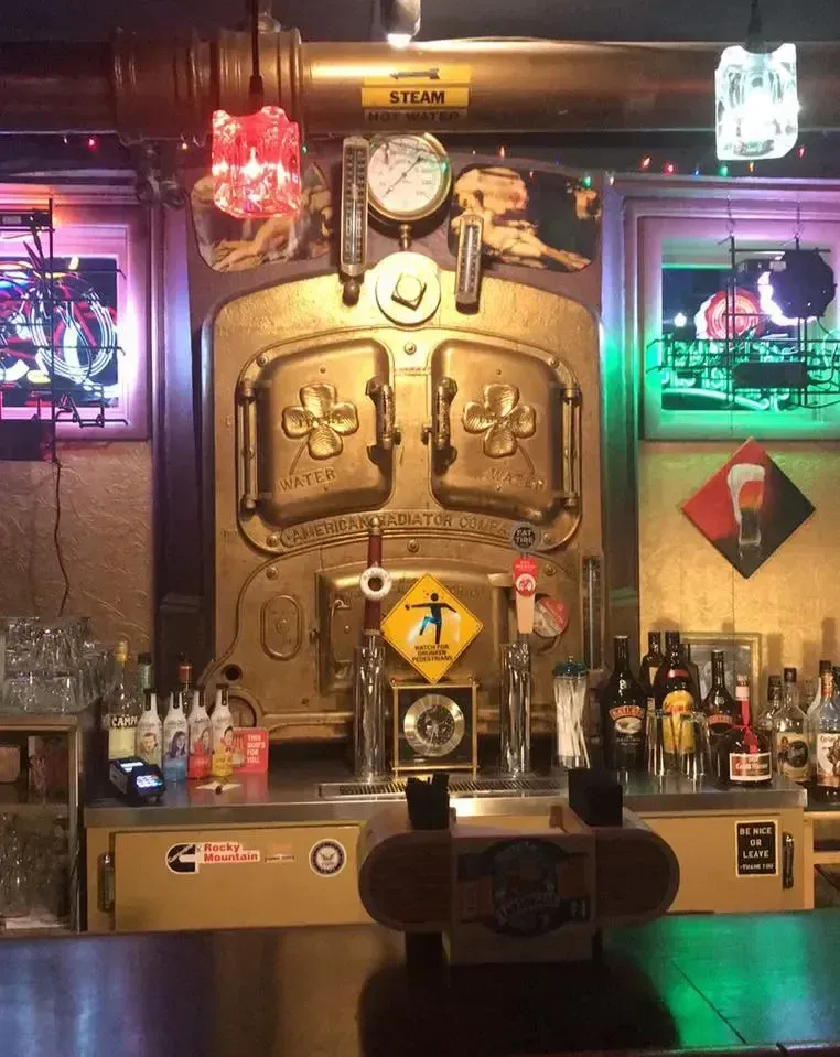 A bar with a clock that says steam on it