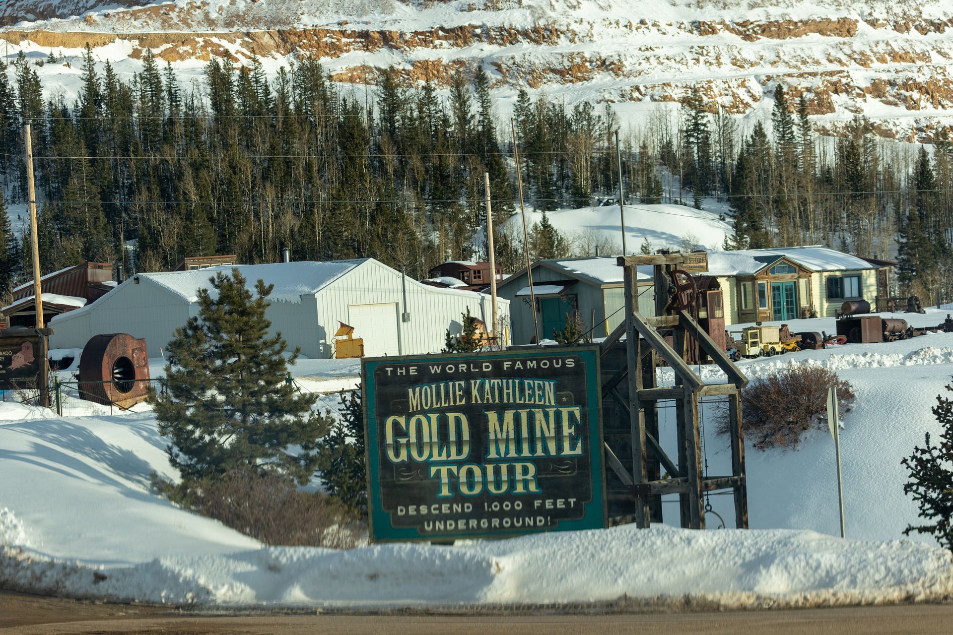 A sign for the wolf valley gold mine tour