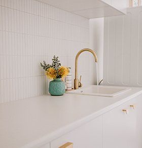 White Kitchen Sink With Gold Tap — Interior Design in Tweed Heads, NSW