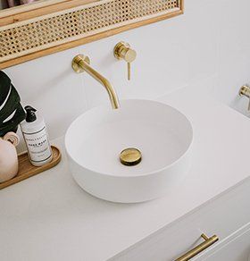 White Sink With Gold Accents — Interior Design in Tweed Heads, NSW