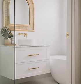 White Bathroom With Gold Accents — Interior Design in Tweed Heads, NSW