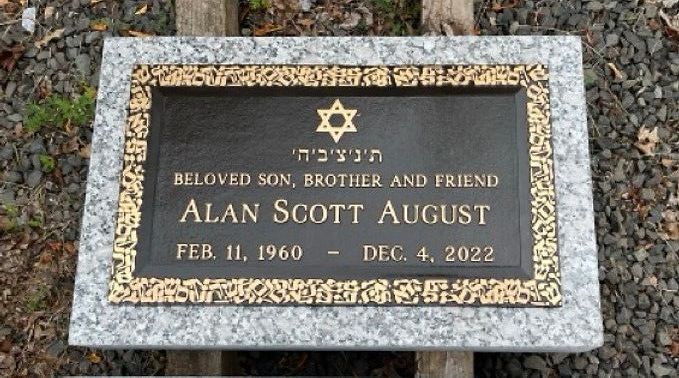 Bronze grave marker with Hebrew text, Star of David, and name