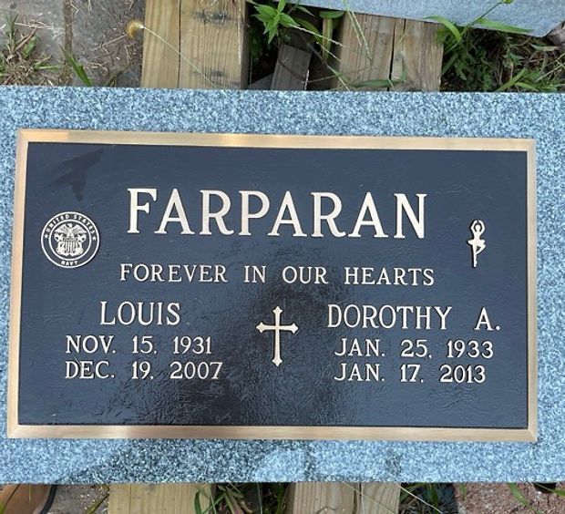 A Crowncrest bronze marker with the Navy Seal honoring the deceased service to his country