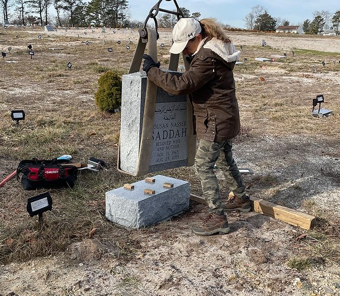 employer installing a tombstone