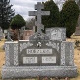 Gravestone with a three-barred cross in Novo-Diveevo Russian Orthodox Cemetery in Nanuet, NY..