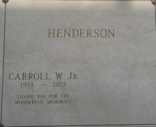 A Mauseleum door with birth and death years, and a message of thanks.