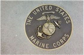 Bronze plaque with the US Marine Corp seal.
