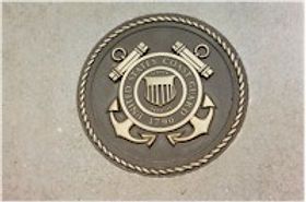 a bronze plaque of the United States Coast Guard seal.