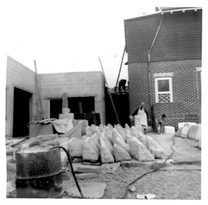 black and white photo of office with grave markers
