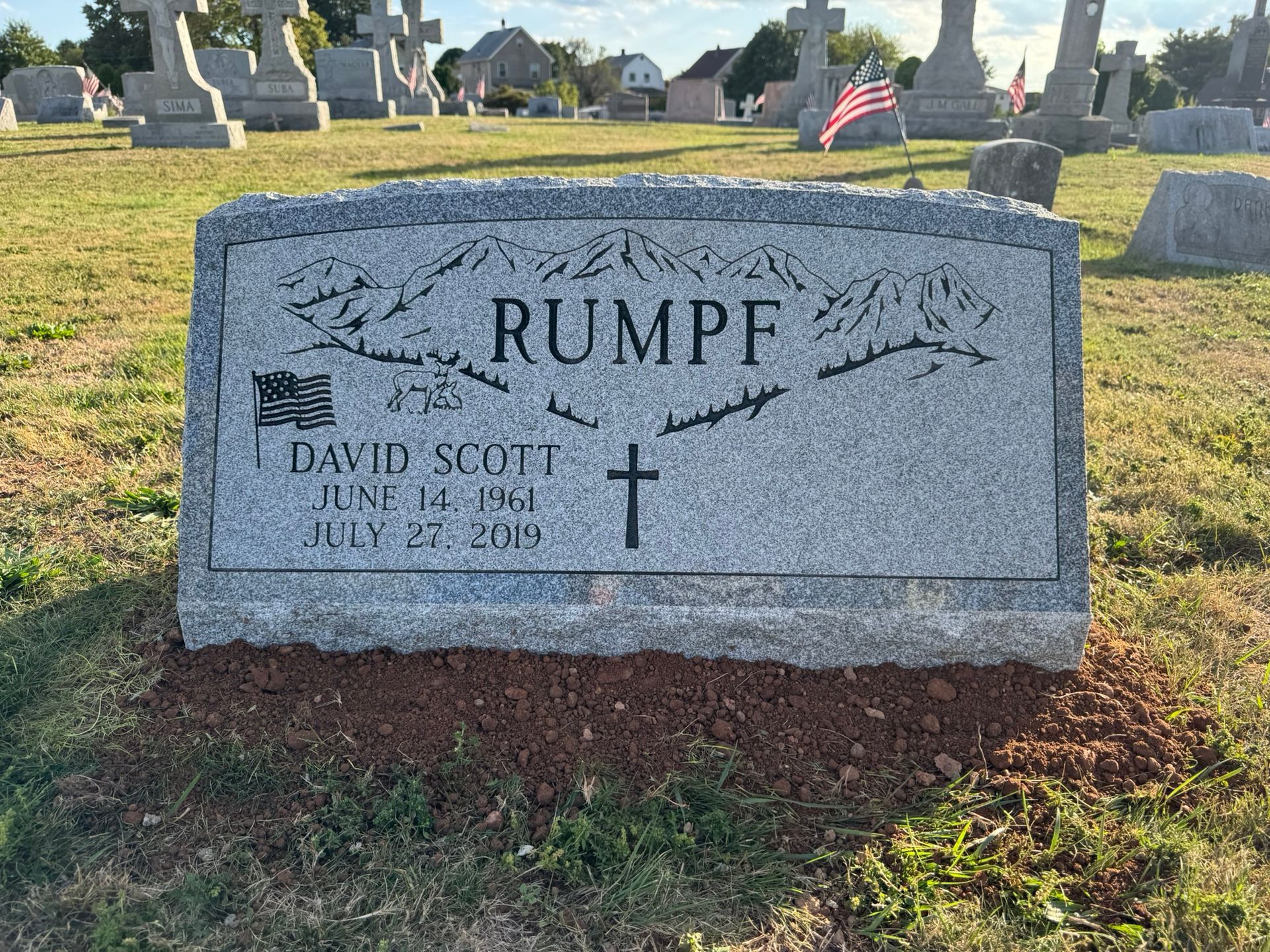 Gray granite tombstone with