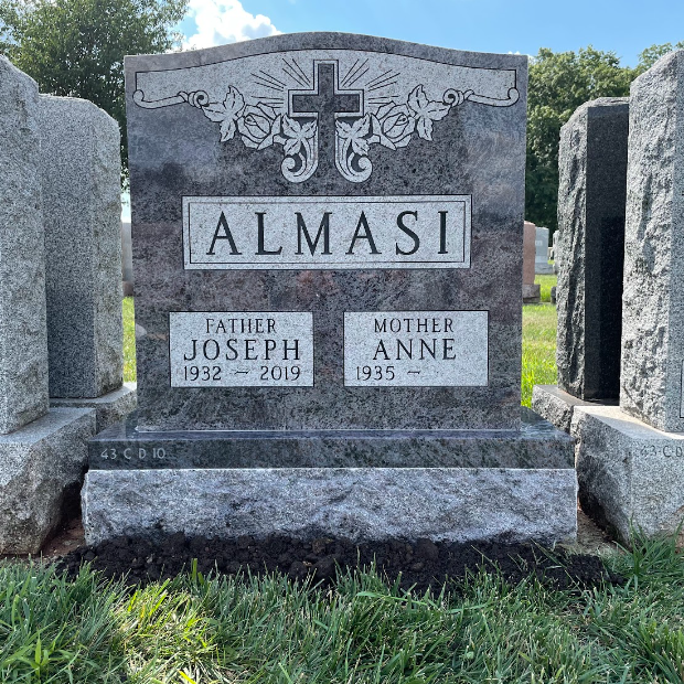 A double upright gravestone for mother and son: Manuela & Osvlado Orduna