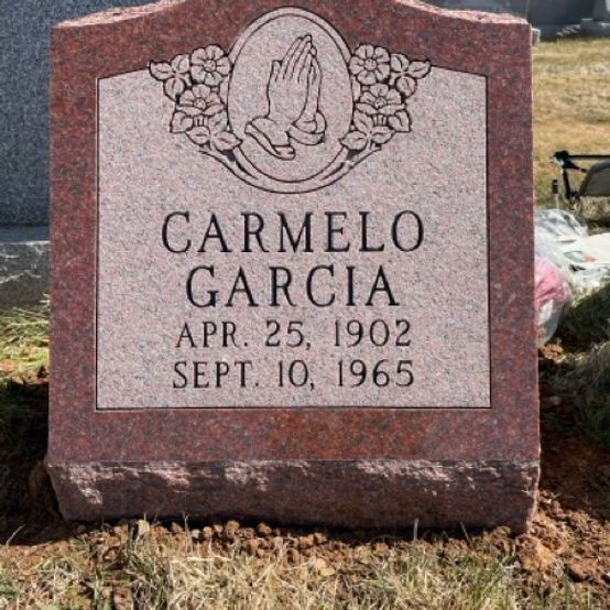 A gravestone for carmelo garcia who died in 1965