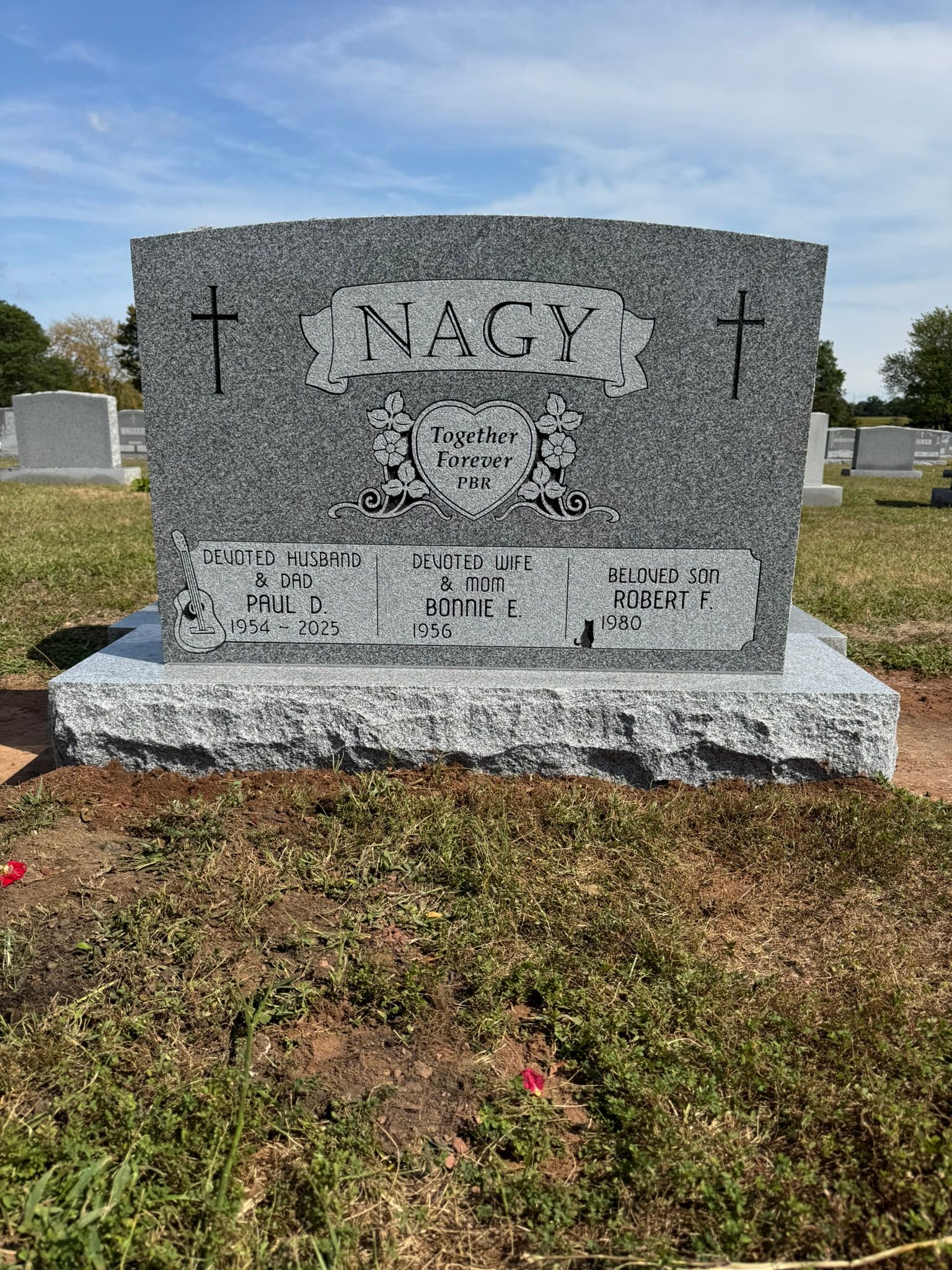 Gray granite headstone with