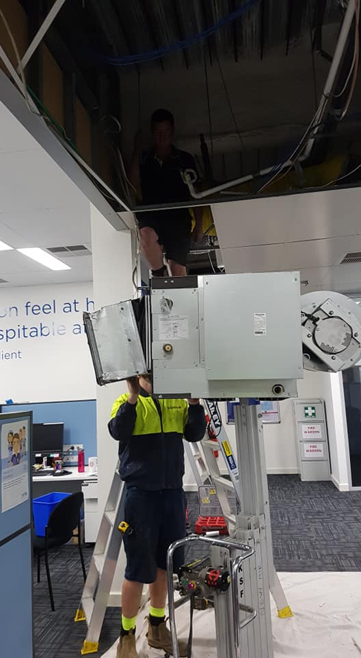 Technicians Installing Air Con — Air Conditioning in New Lambton, NSW